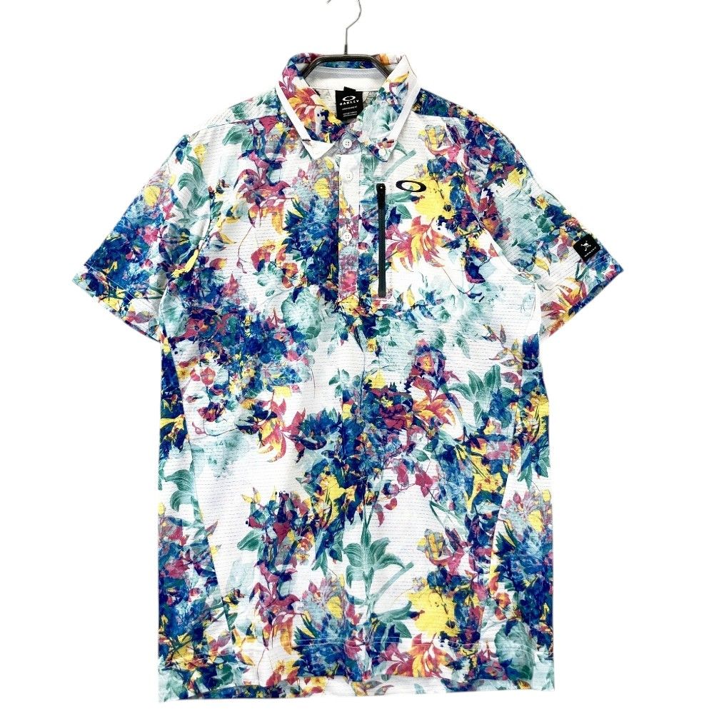 サイズ：L OAKLEY オークリー  半袖ポロシャツ 花柄 ホワイト系 [240101416957] ゴルフウェア メンズ ストスト サイズ：L OAKLEY オークリー 半袖ポロシャツ 花柄 ホワイト系