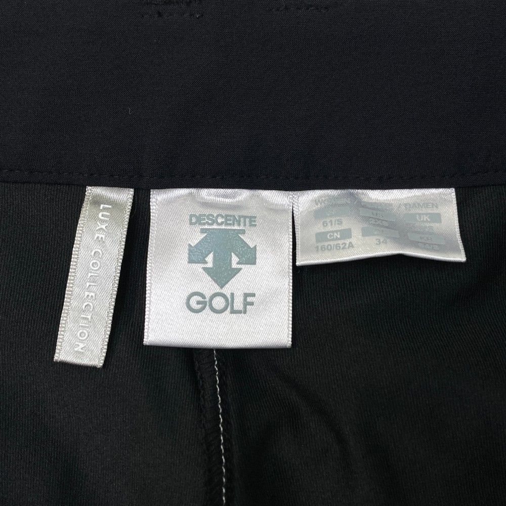サイズ：61/S DESCENTE GOLF デサントゴルフ  インナー付 プリーツスカート  ブラック系 [240101444718] ゴルフウェア レディース ストスト サイズ：61/S DESCENTE GOLF デサントゴルフ インナー付