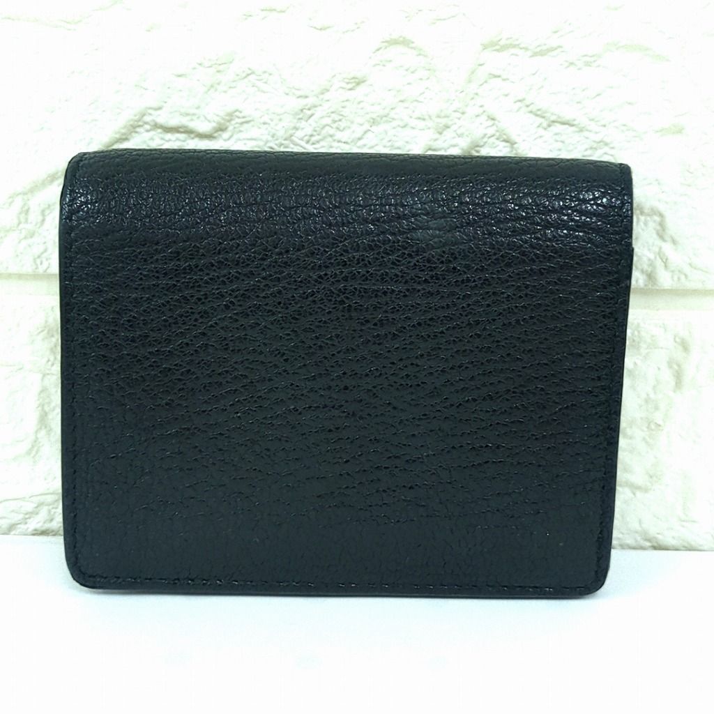 ミュウミュウ 2つ折り財布 マドラス パール ンパクトウォレットブラック ミュウミュウ 2つ折り財布 マドラス パール ンパクトウォレット
