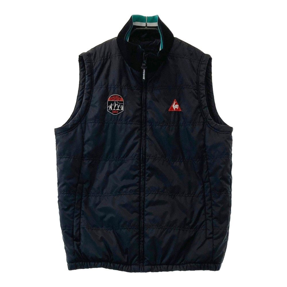 サイズ：L LE COQ GOLF ルコックゴルフ  中綿　ジップベスト ワッペン  ブラック系 [240101338465] ゴルフウェア メンズ ストスト