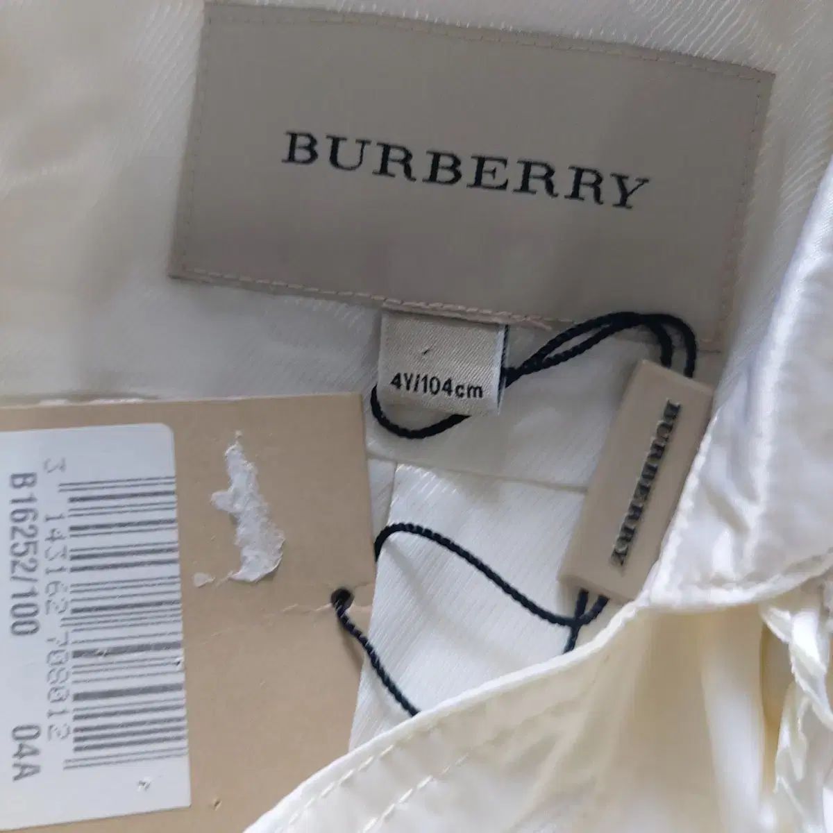 フリル トレンチコート