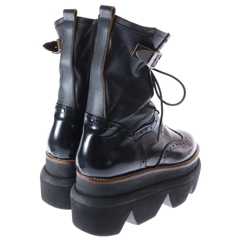 Leather Chelsea boots in black - Sacai | Mytheresa