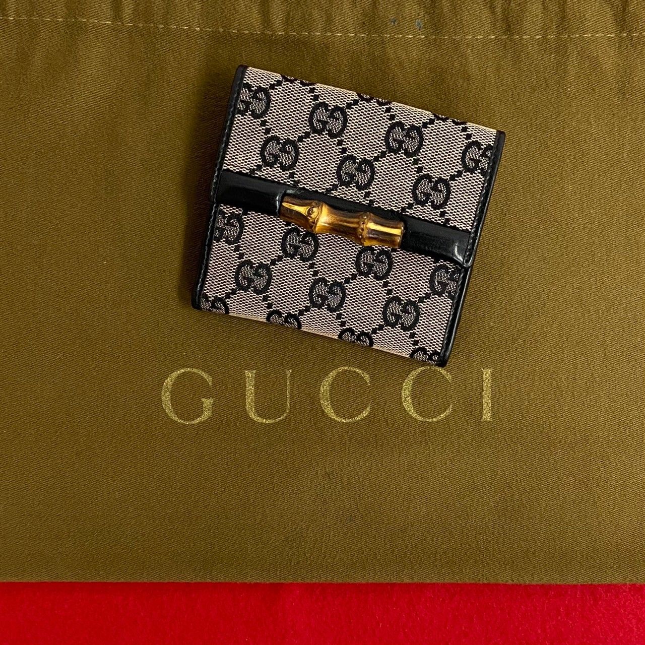 GUCCI 二つ折り財布 GGキャンバス バンブー金具 楽天市場】【新品】 グッチ 二つ折り財布 札入れ 小銭入れ無し