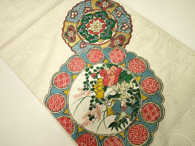 平和屋着物○太鼓柄袋帯 紬地 総刺繍 花唐草文 蘇芳色
