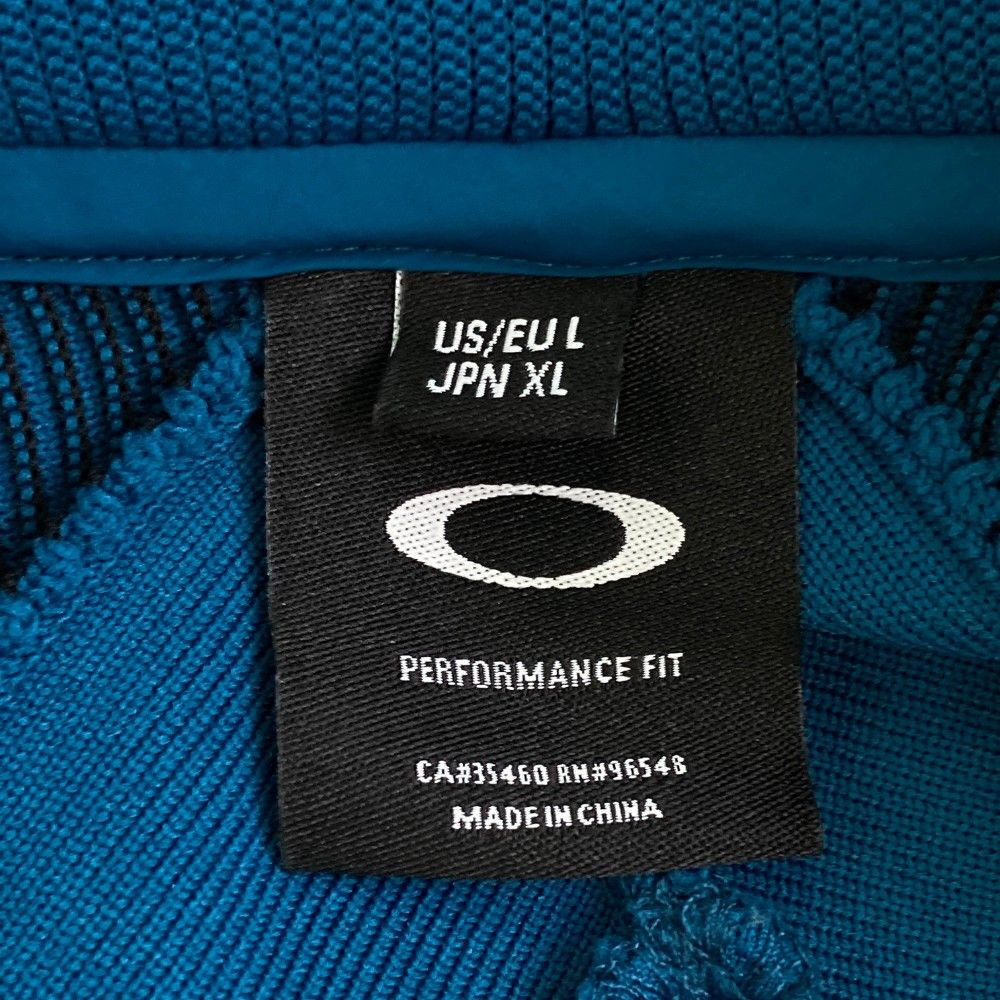 サイズ：XL OAKLEY オークリー  切替ジャケット  ブルー系 [240101435453] ゴルフウェア メンズ ストスト サイズ：XL OAKLEY オークリー 切替ジャケット ブルー系