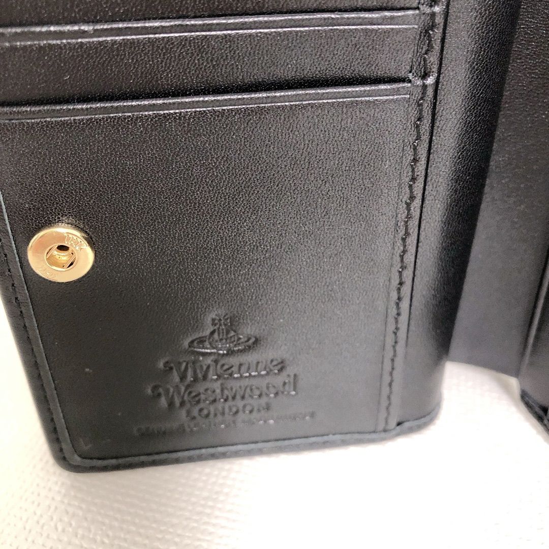 新品】ショッパー付き 大人気 Vivienne Westwood 黒 ミニ財布