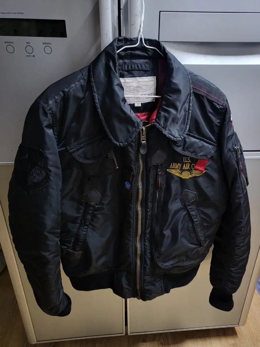 M 新品 TNGT スイングトップ ブルゾン カーキ 105 航空 ブルゾン