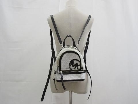 マイケルコース MICHAEL KORS ミニリュック PVCキャンバス レザー ホワイト ブラック レディース