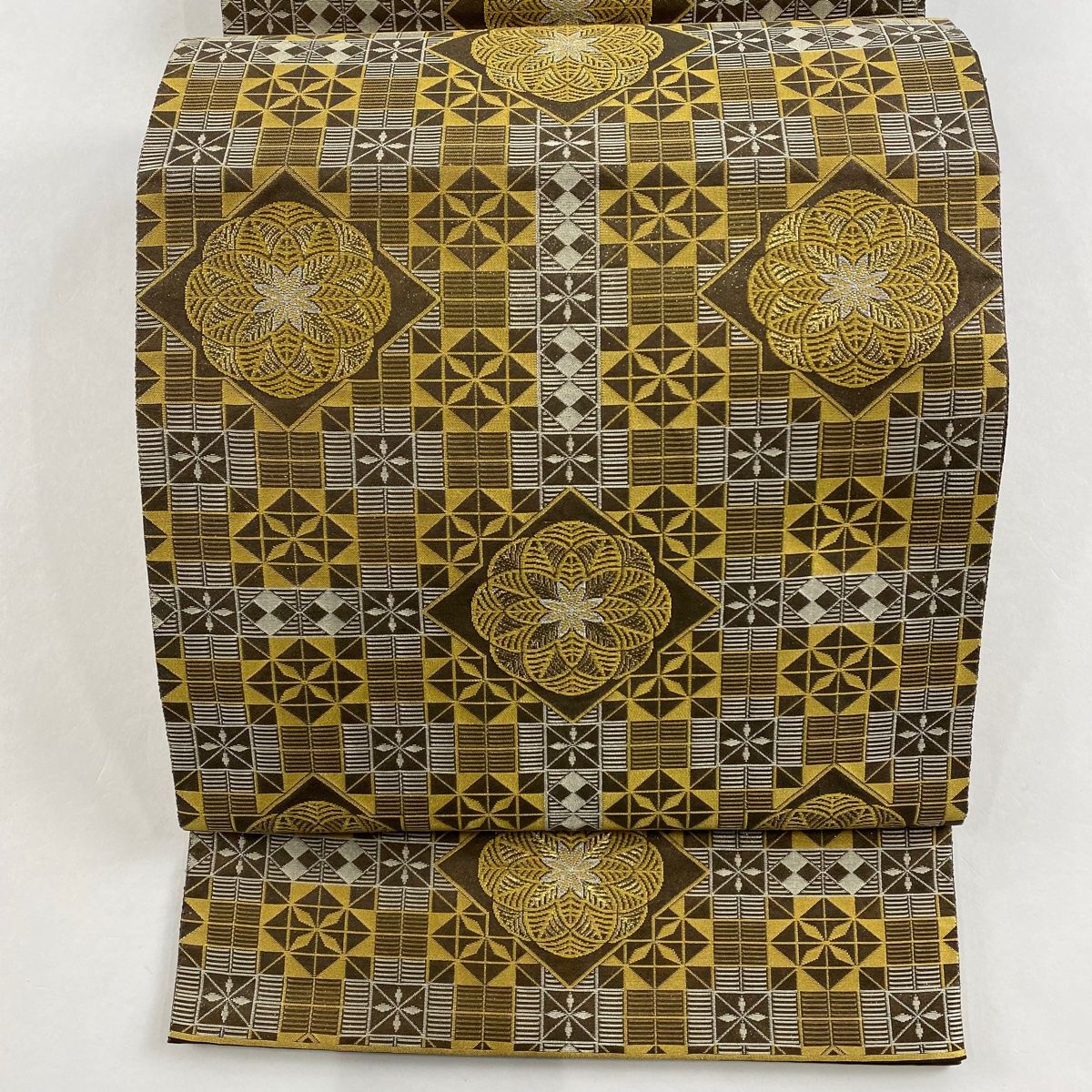 袋帯 美品 名品 心苦しかっ 幾何学 焦茶色 六通 正絹 中古