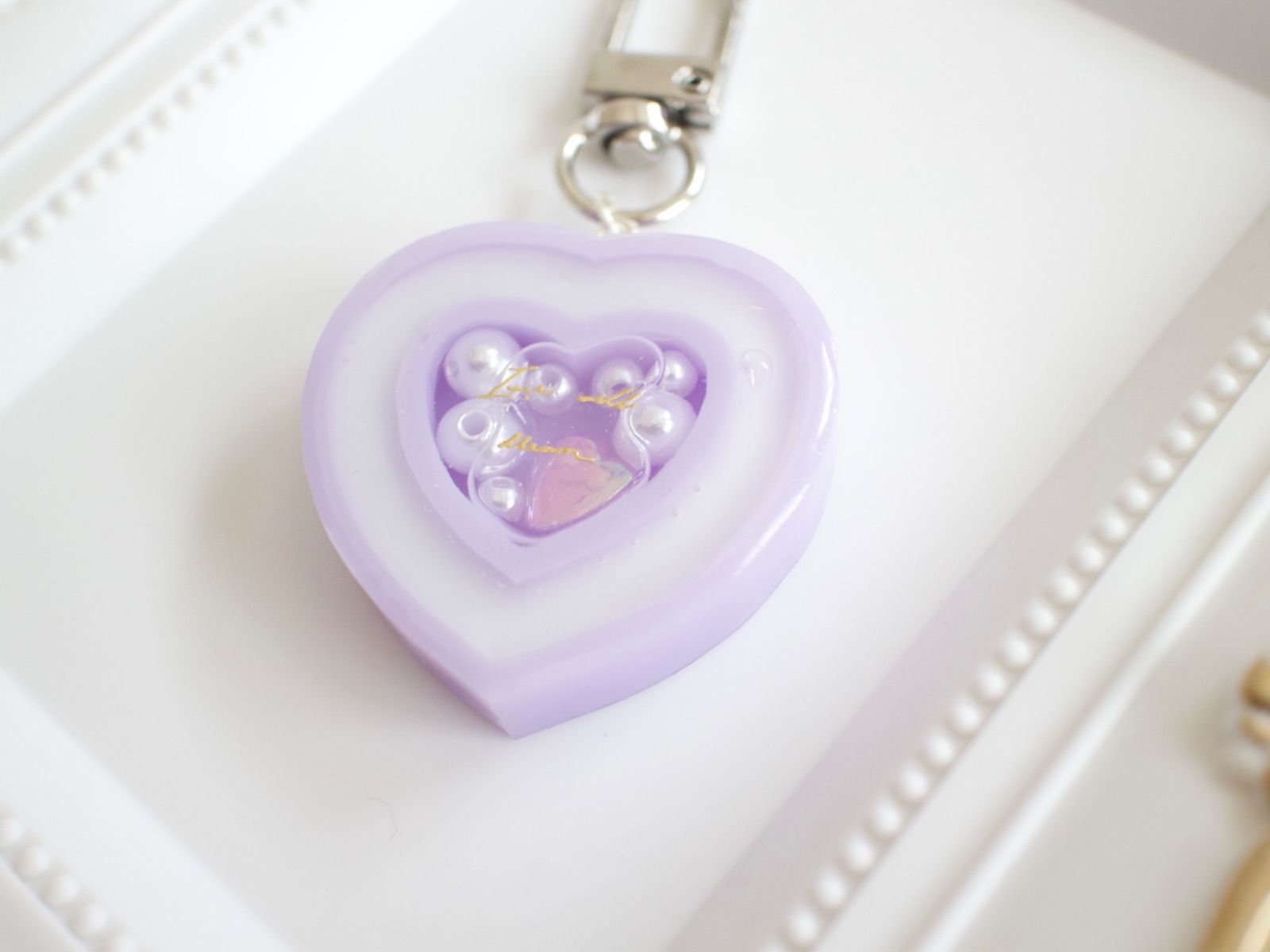 ダブルハートシェイカー 紫×白 シャカシャカキーホルダー - メルカリ
