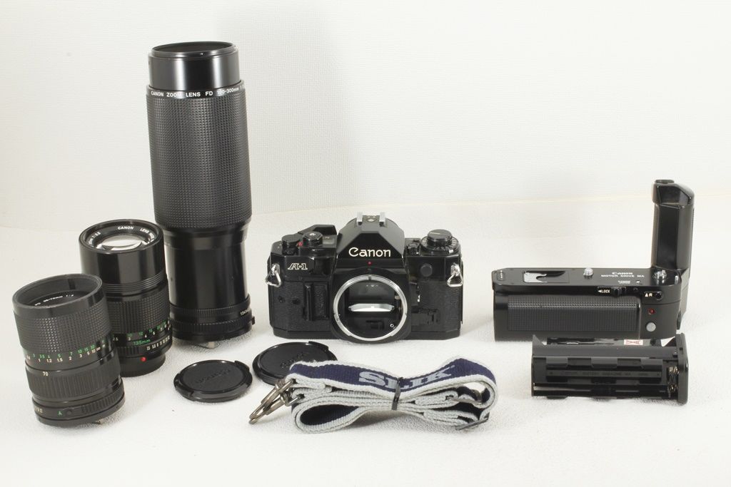 Canon A-1 フィルムカメラ レンズ、おまけ付き　ジャンク ジャンク品 Canon キヤノン A-1 レンズ3本 ワインダー フィルム