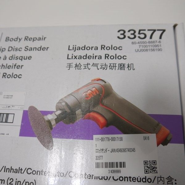 33577