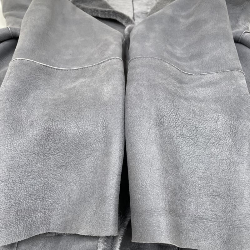 コート Manzoni