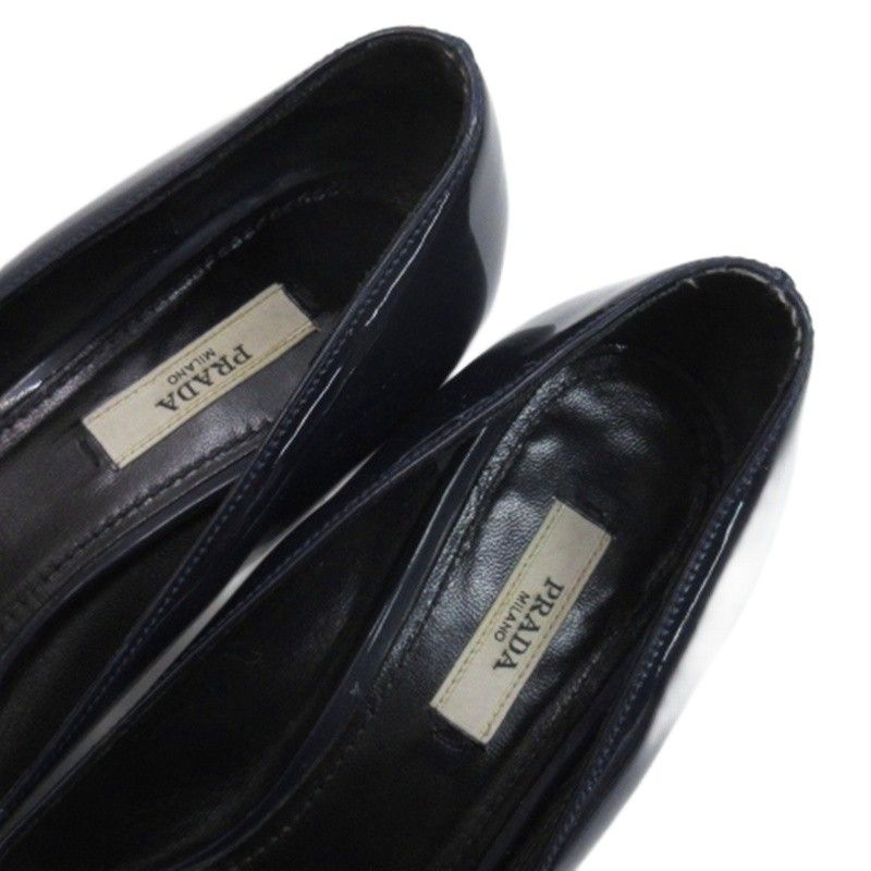 PRADA プラダ パンプス エナメル　ヒール　ロゴ リボン プラダ PRADA リボンモチーフ エナメル パンプス ポインテッド