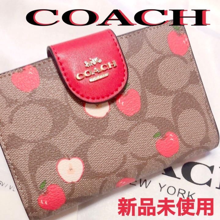 新品 コーチ COACH シグネチャー アップルプリント 二つ折り財布