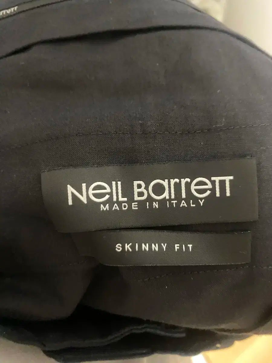 NEIL BARRENTT