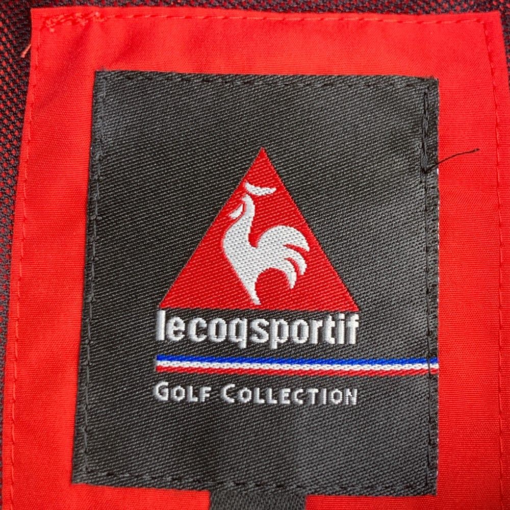 サイズ：L LE COQ GOLF ルコックゴルフ  ハーフジップ 半袖ブルゾン  レッド系 [240101432962] ゴルフウェア メンズ ストスト LE COQ GOLF ルコックゴルフ ハーフジップ 半袖ブルゾン レッド