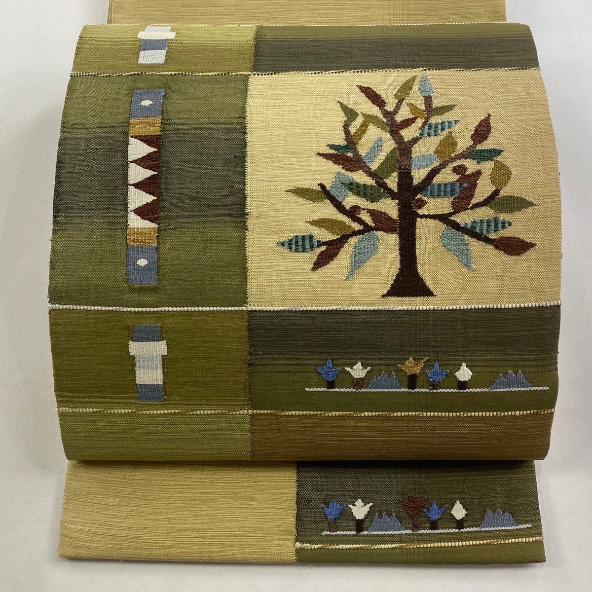 袋帯 秀品 紬地 樹木 幾何学模様 ベージュ 六通 正絹