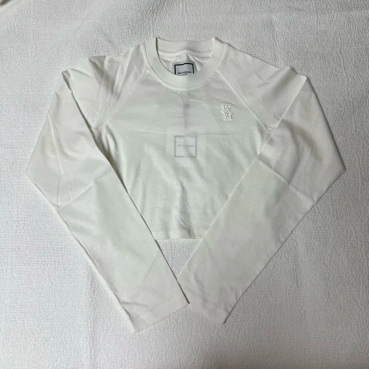 ウー ヨンミ レディース 白 クロップド 長袖 Tシャツ