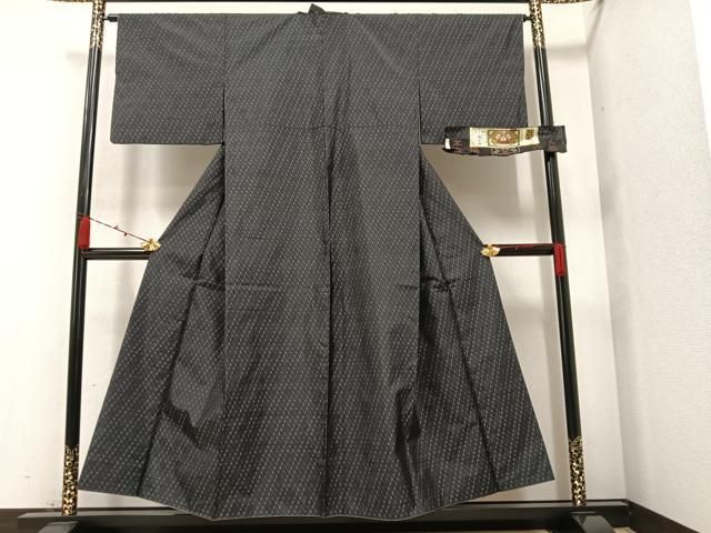 【大型本】絣　本 平和屋着物○本場大島紬 一元絣 雪輪重ね花文 黒地 正絹 逸品