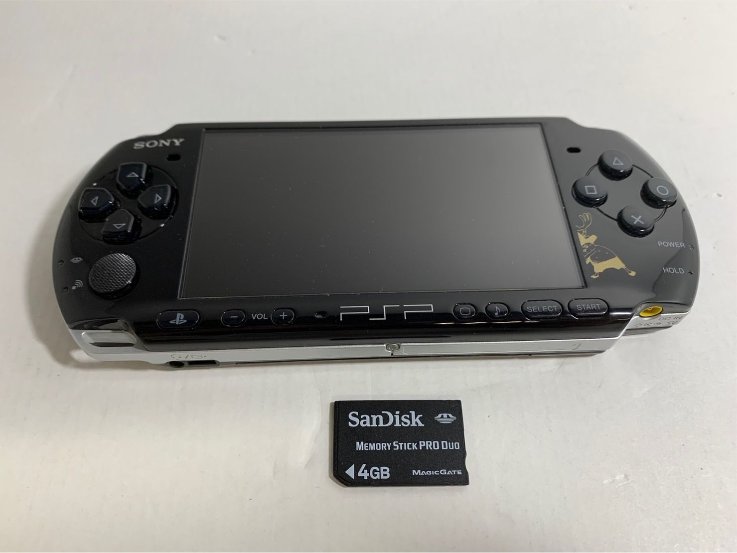 25.PSP-3000 ワンピース 麦わらの一味エディション バッテリー無し 本体のみ ジャンク ▲