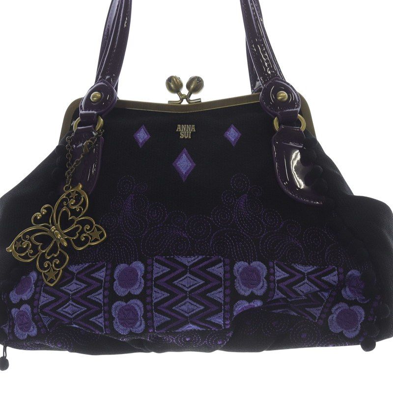蝶のチャーム付き　ANNA SUI 黒 ハンドバッグ ANNASUI】アナスイ蝶チャーム付き黒レザーハンドバッグ - メルカリ