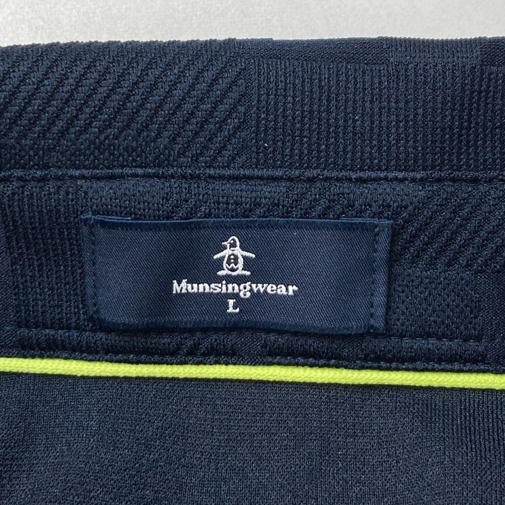 サイズ：L MUNSING WEAR マンシングウェア 2023年モデル 長袖ポロシャツ 総柄 ネイビー系 [240101425936] ゴルフウェア メンズ ストスト MUNSING WEAR マンシングウェア 長袖ポロシャツ ネイビー系