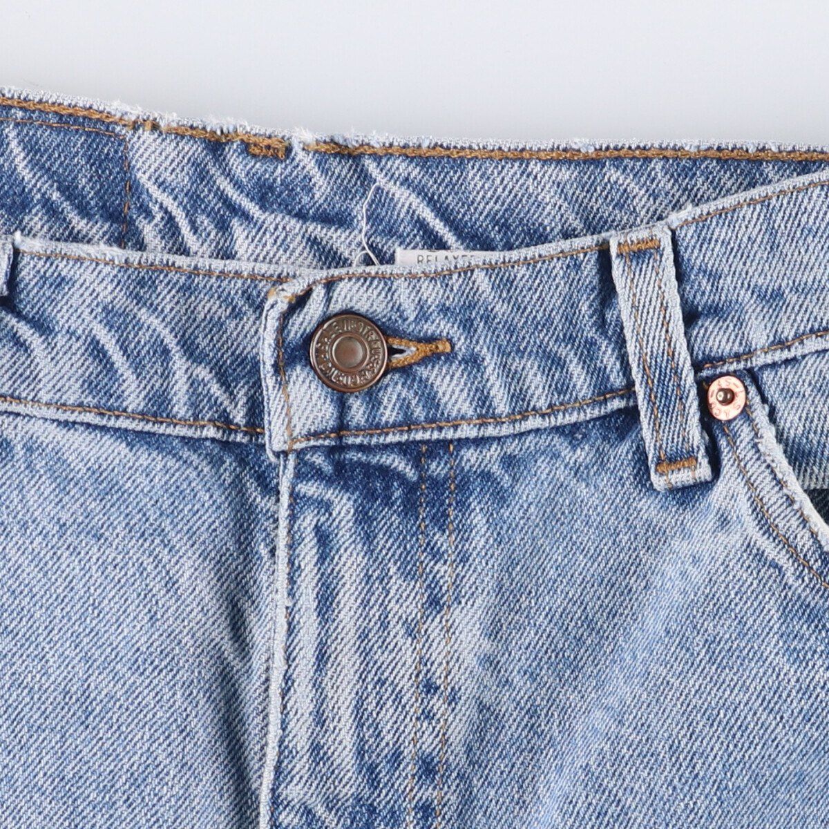 オレンジタブ テーパードデニムパンツ