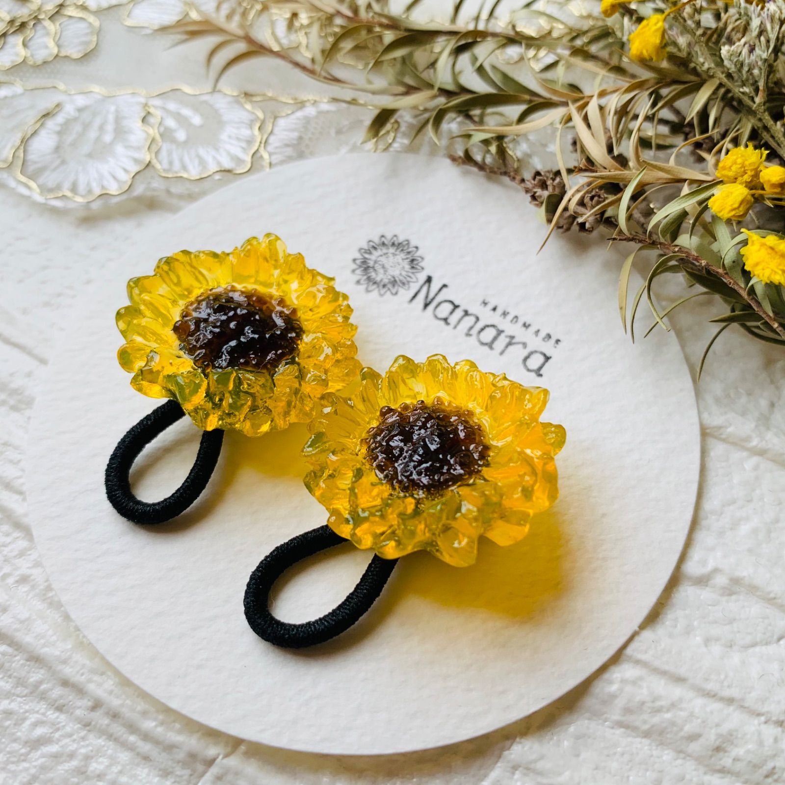 ひまわりヘアゴム🌻2点セット - メルカリ