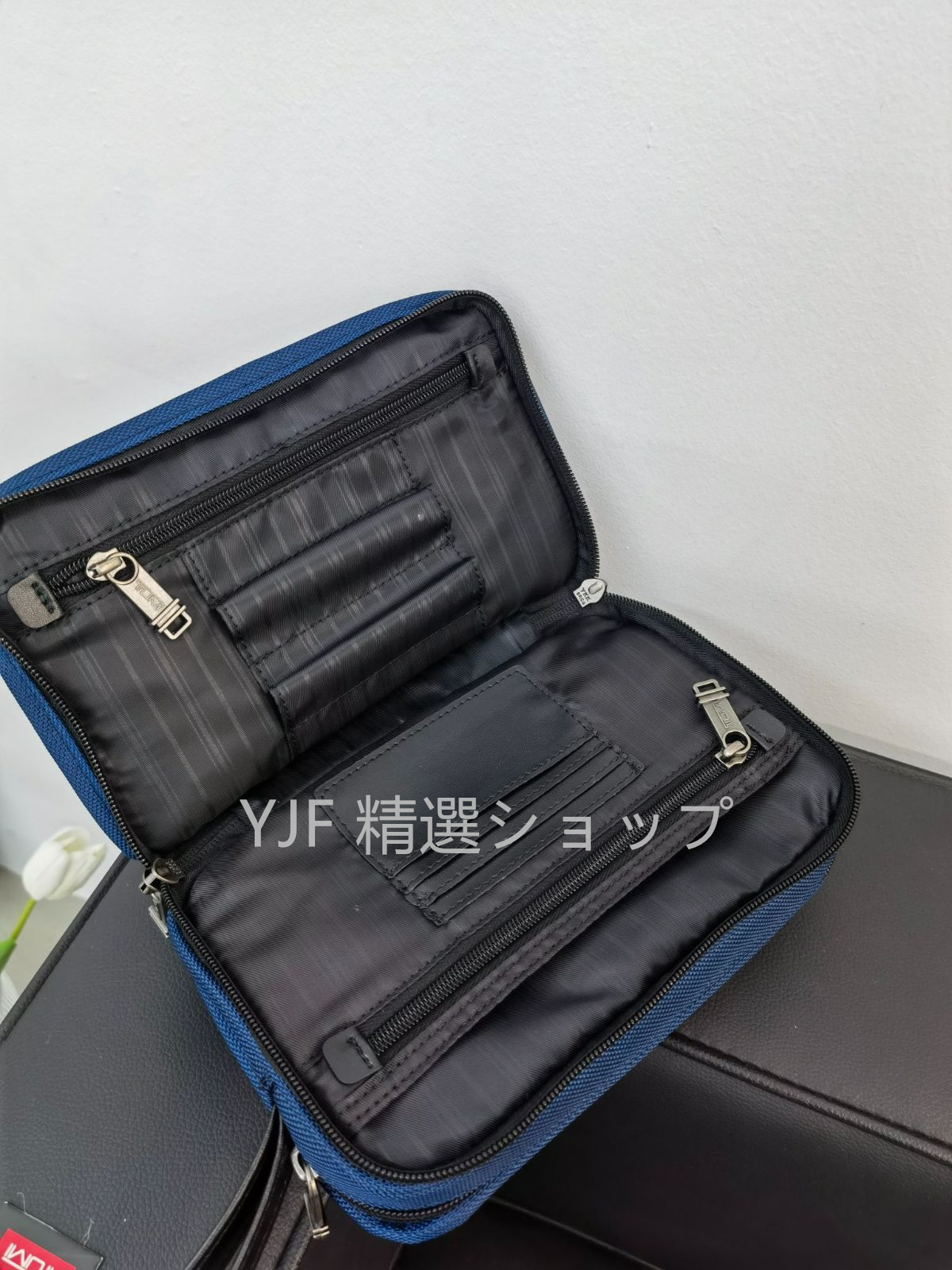 新品✨　TUMI　クラッチバッグ　ネイビーブルー　22104　おしゃれ　日常用　メンズバッグ　多機能　大容量