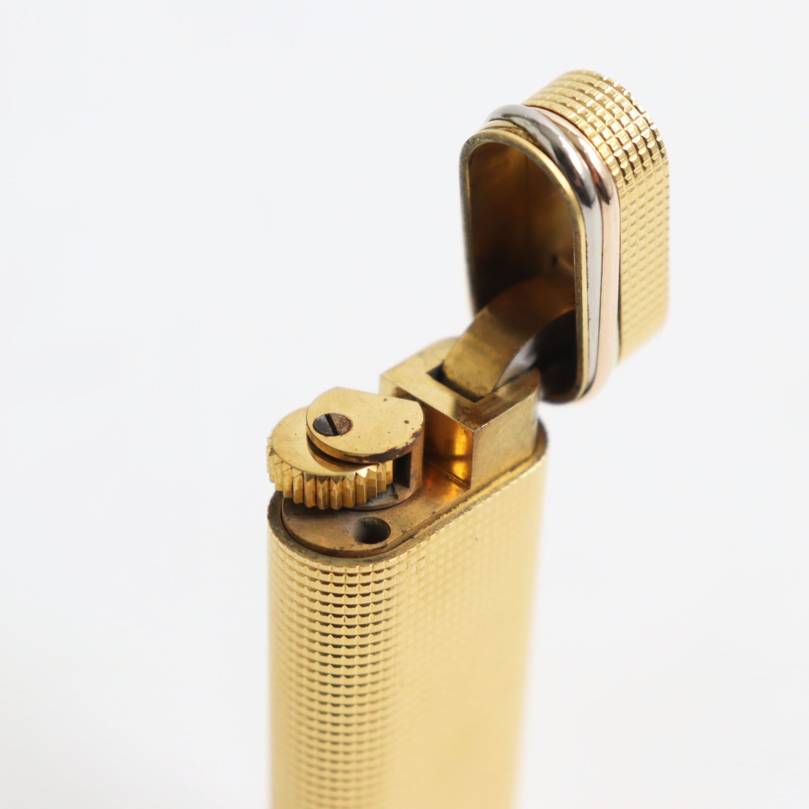 良品 Cartier カルティエ トリニティ ブロックチェック ローラー式 ガスライター ゴールド スイス製 メンズ レディース 着火確認済み -  メルカリ