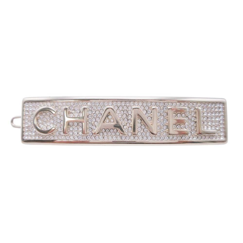 21年 シャネル CHANEL クルーズライン ロゴ バレッタ ラインストーン ヘアアクセサリー クリップ ゴールド B21C レディース 古着