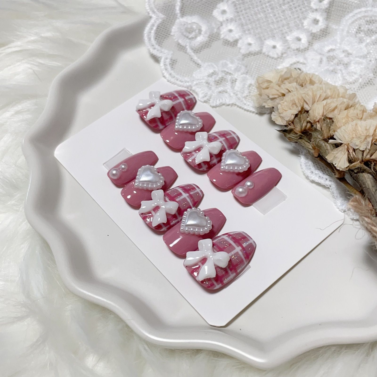 現品】85 《3日以内発送》 ネイルチップ ピンク パール ハート リボン  