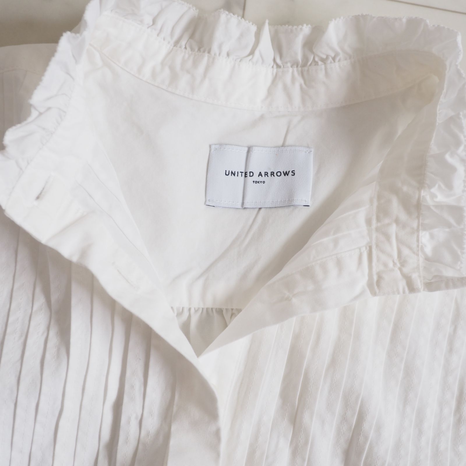 UNITED ARROWS フリルホワイトチュニック UNITED ARROWS フリルホワイトチュニック