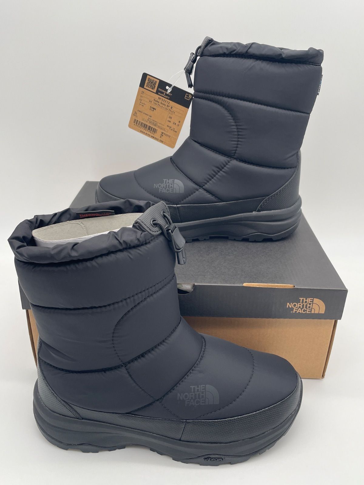 メルカリショップス開設記念価格 THE NORTH FACE ザノースフェイス 防寒ブーツ Nuptse Bootie WP ヌプシ ブーティ ウォータープルーフ VII NF52272 ユニセックス NFブラック×TNFブラック 7 24.0cm