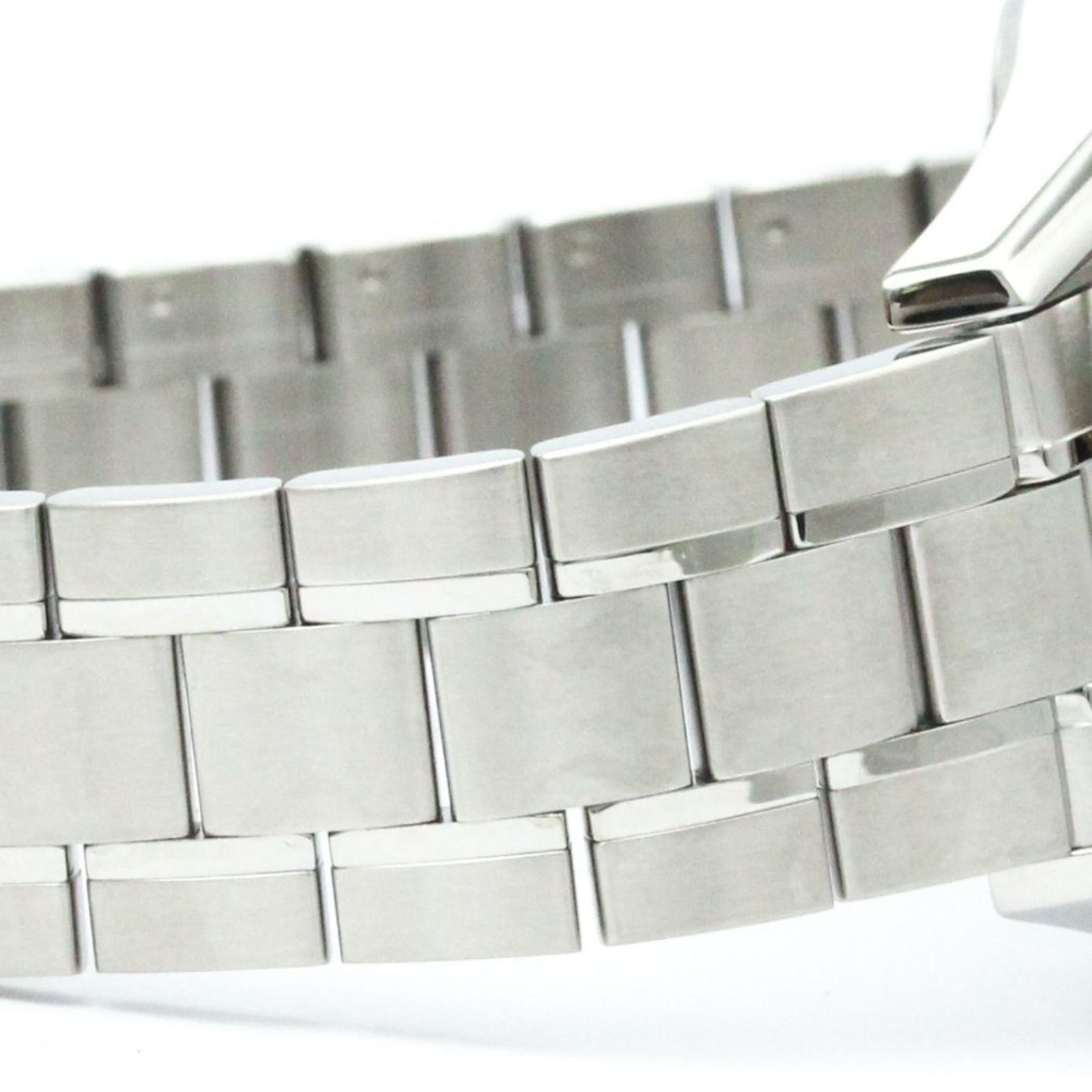 クリアな青緑に鮮やか黄で、回転する輪状モチーフのモザイク小型平玉