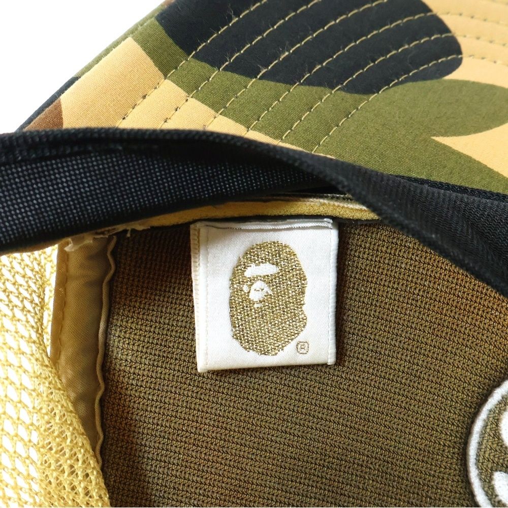 A BATHING APE (アベイシングエイプ) ×STUSSY 1ST CAMO TRUCKER