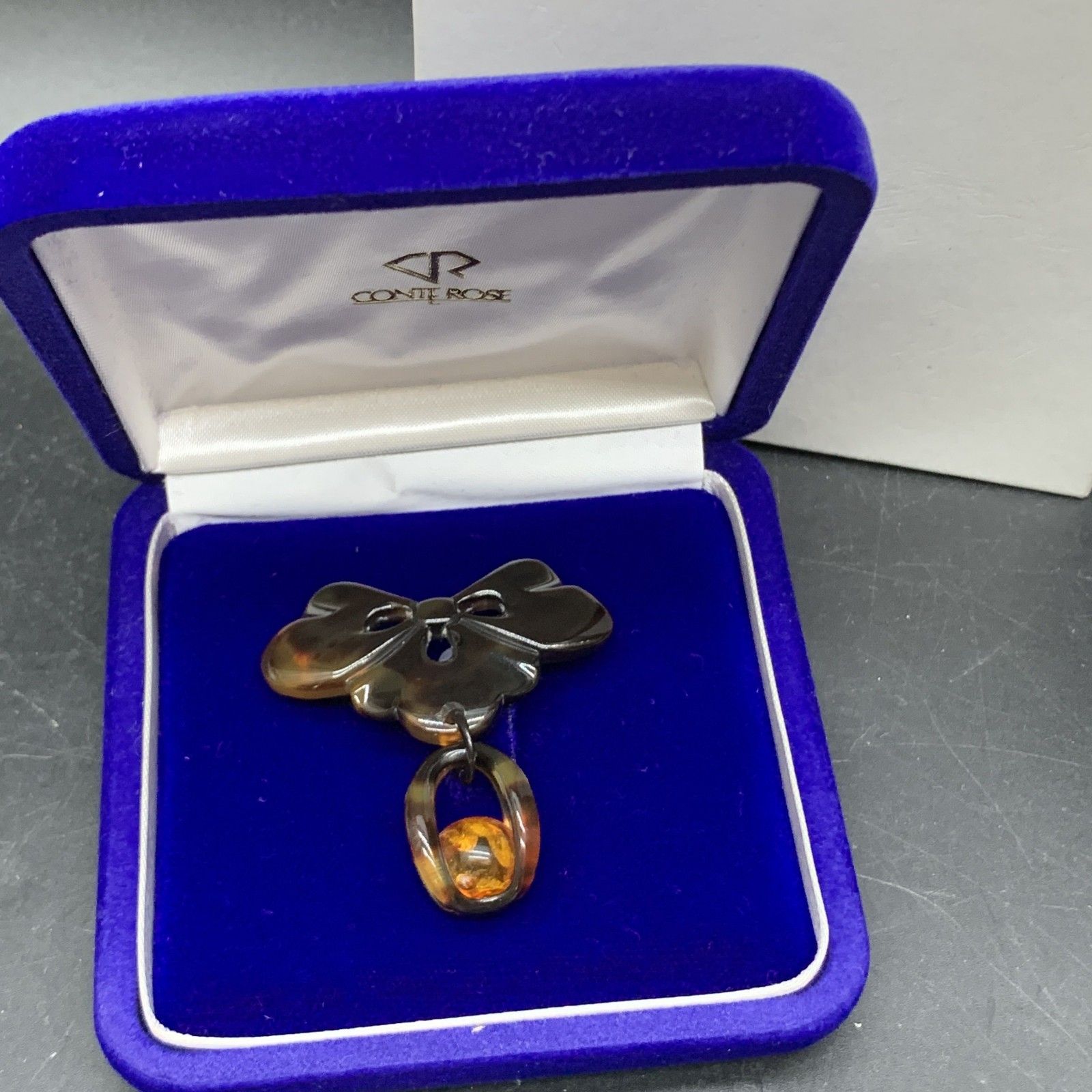 O333未使用保管品 本物 べっ甲柄 琥珀 ブローチ 重量5g 鼈甲色 べっ