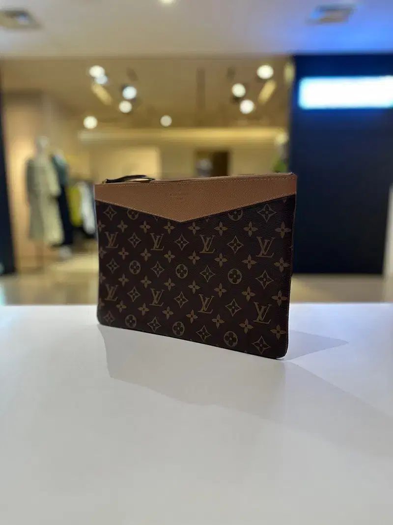Louis Vuitton モノグラム キャンバス デイリー ポーチ クラッチバッグ M64591