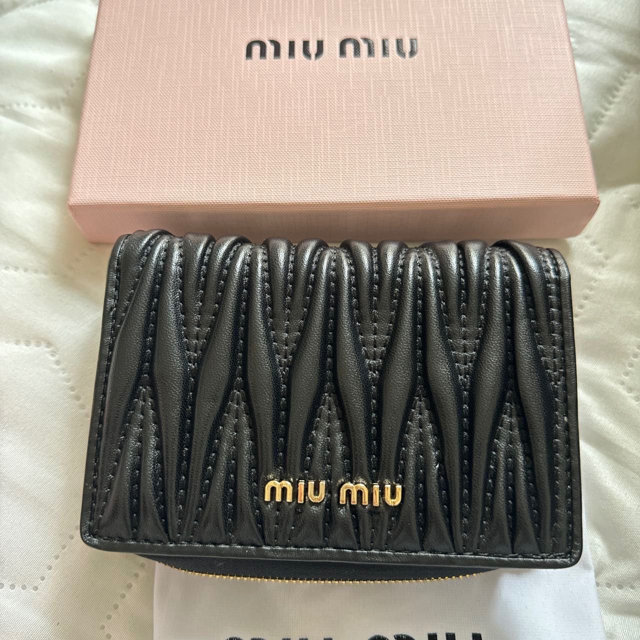 新品未使用MIU MIU 2つ折り財布ブラック - メルカリ