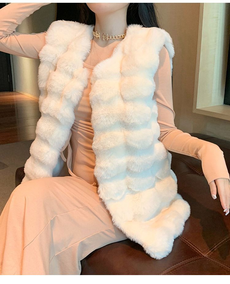 ファーベスト 毛皮ベスト レディース 韓国風 目玉 高級感 エコファー
