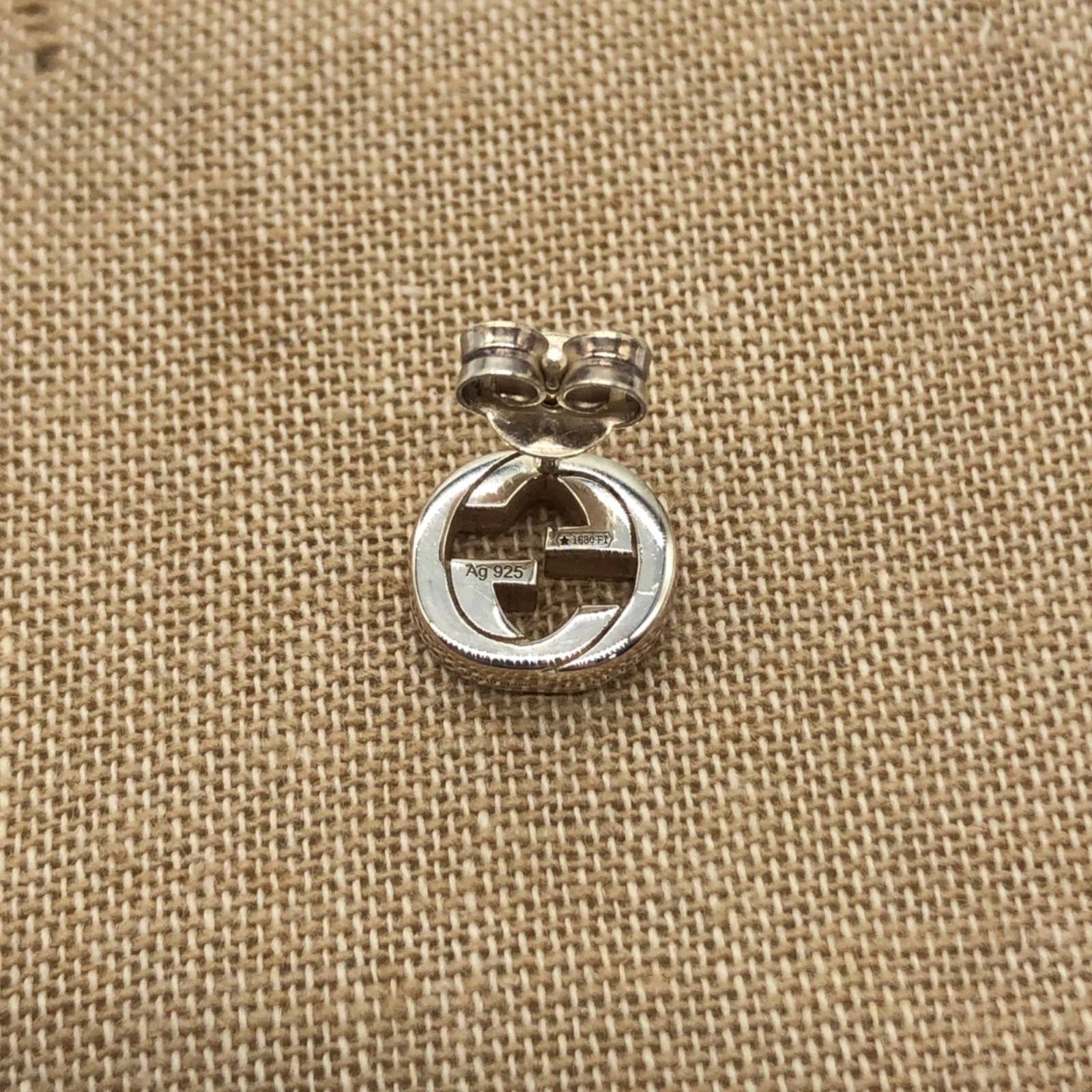 ♪0758 GUCCI インターロッキングG 片耳ピアス 925 - メルカリ