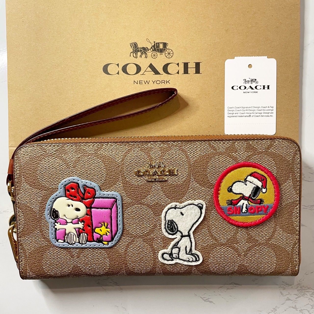 新作【COACH X PEANUTS】シグネチャーロングジップアラウンド長財布