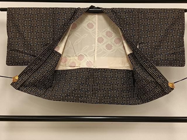 平和屋着物○本場大島紬 龍郷絣 手織り 富常豊作 証紙付き 正絹 逸品