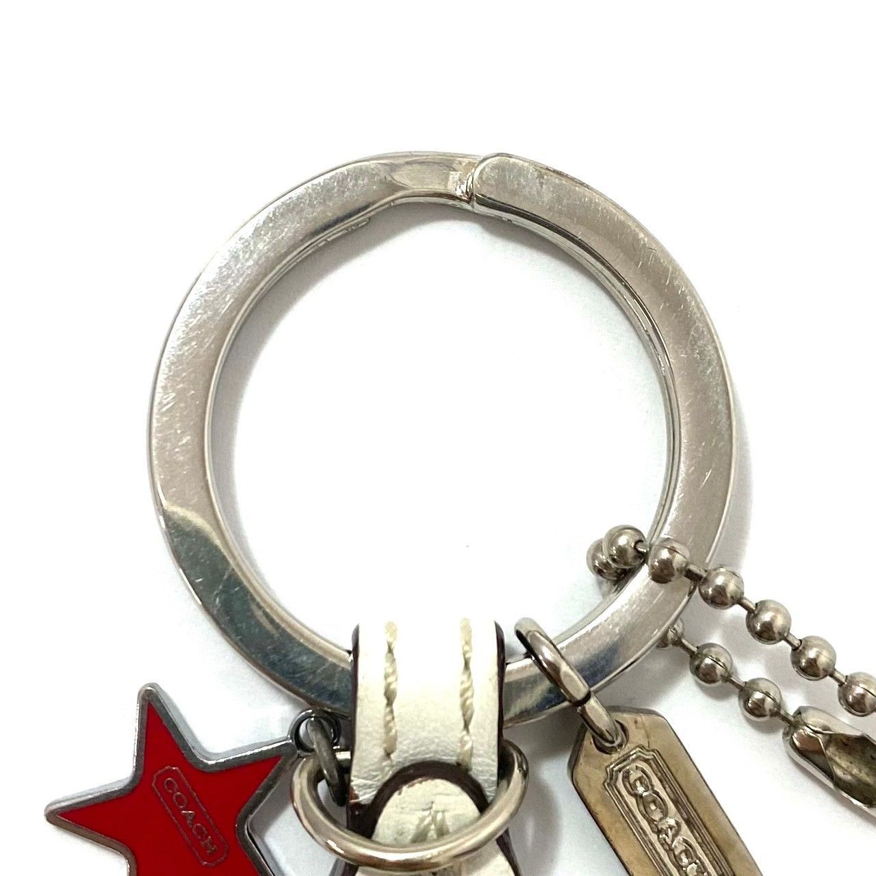 COACH】シグネチャー キーホルダー スターモチーフ レザー