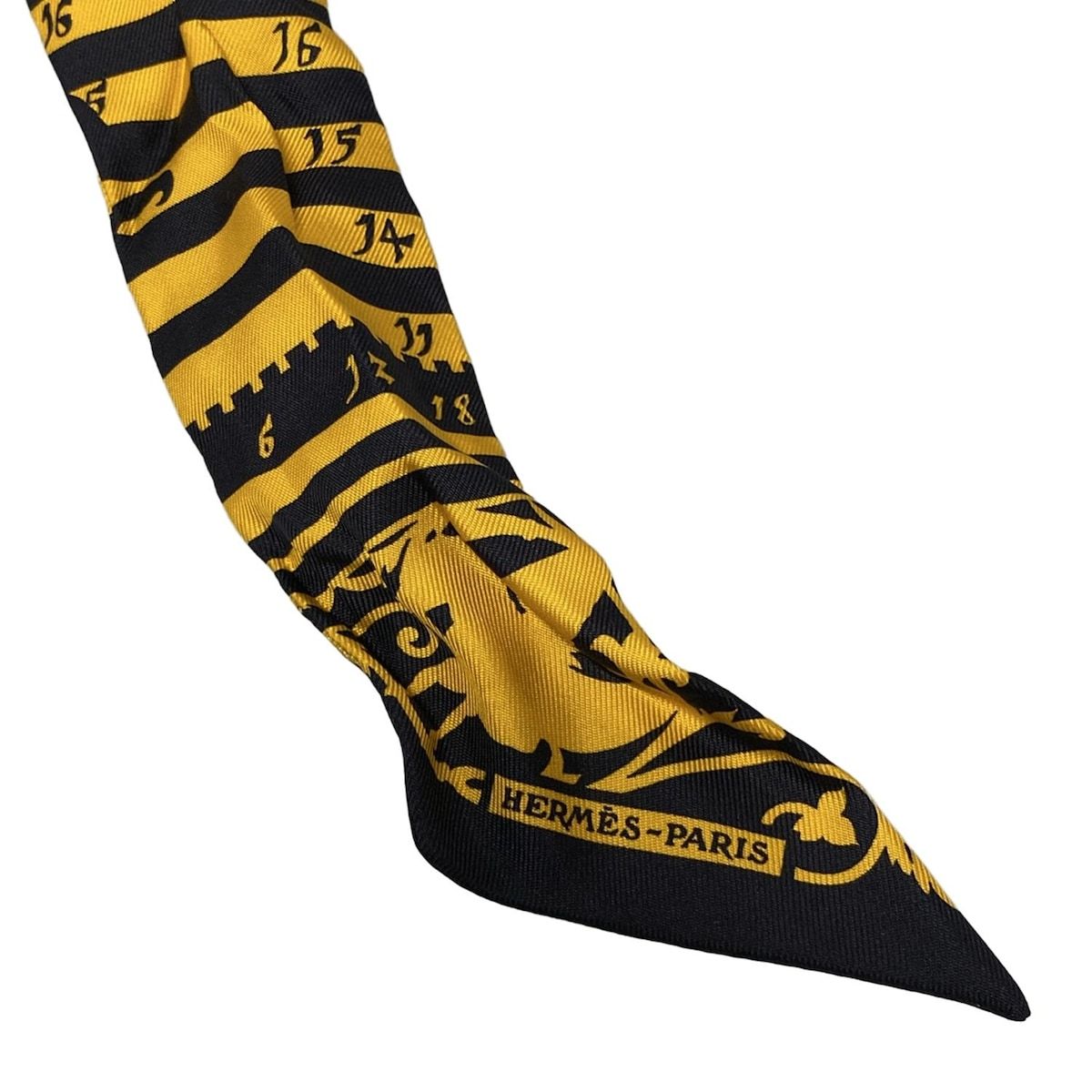 HERMES(エルメス) スカーフ美品 ツイリー グレー×黒×オレンジ リボン  