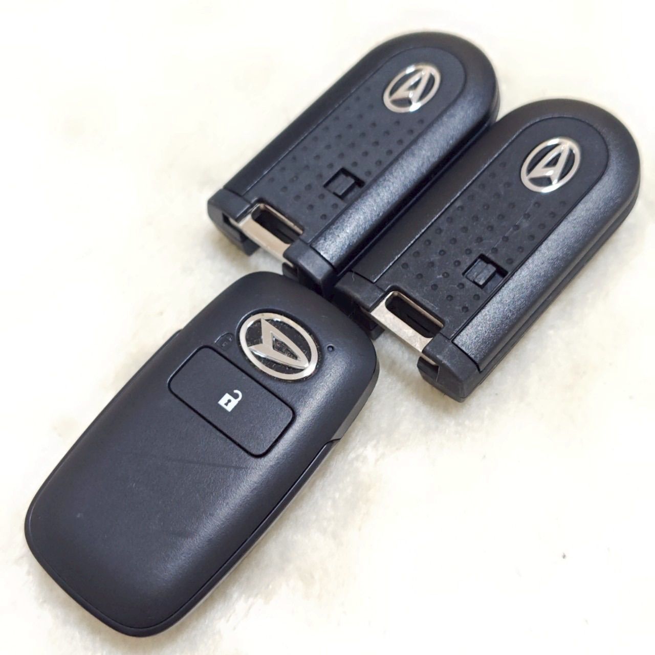 B28723｜ダイハツ 純正 スマートキー 4ボタン 刻印007-AG0115 DENSO