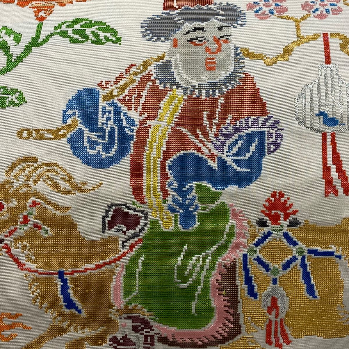 袋帯 逸品 龍村平蔵 落款 人形手糸入錦 草花 箔 クリーム お太鼓