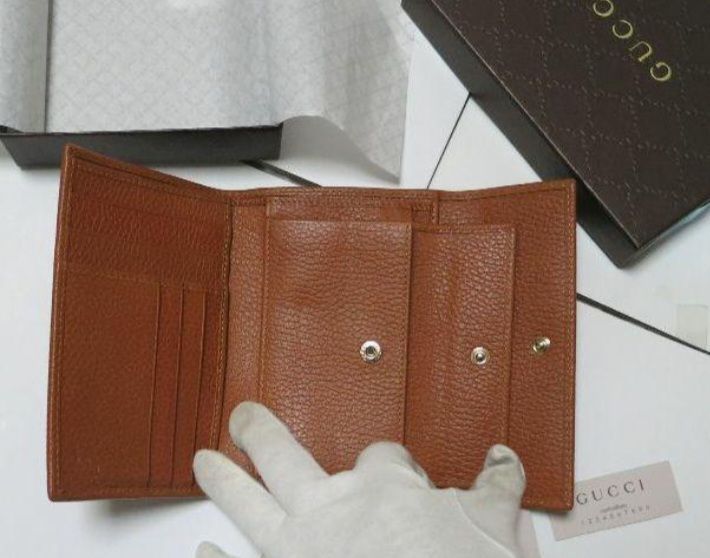 Gucci 財布 レディース 茶色 中古良品 送料込み - メルカリ 