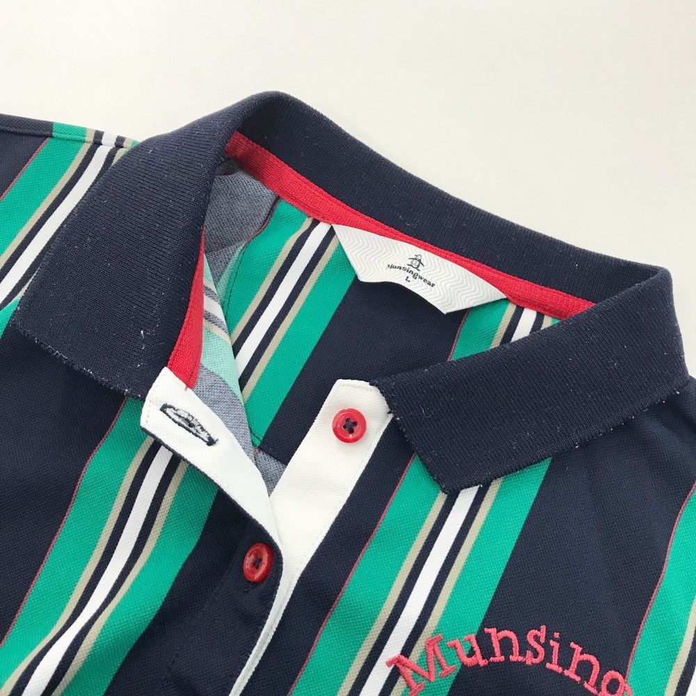 サイズ：L MUNSING WEAR マンシングウェア  半袖 ワンピース ワッペン ストライプ柄 ホワイト系 [240101487819] ゴルフウェア レディース ストスト サイズ：L MUNSING WEAR マンシングウェア 半袖 ワンピース